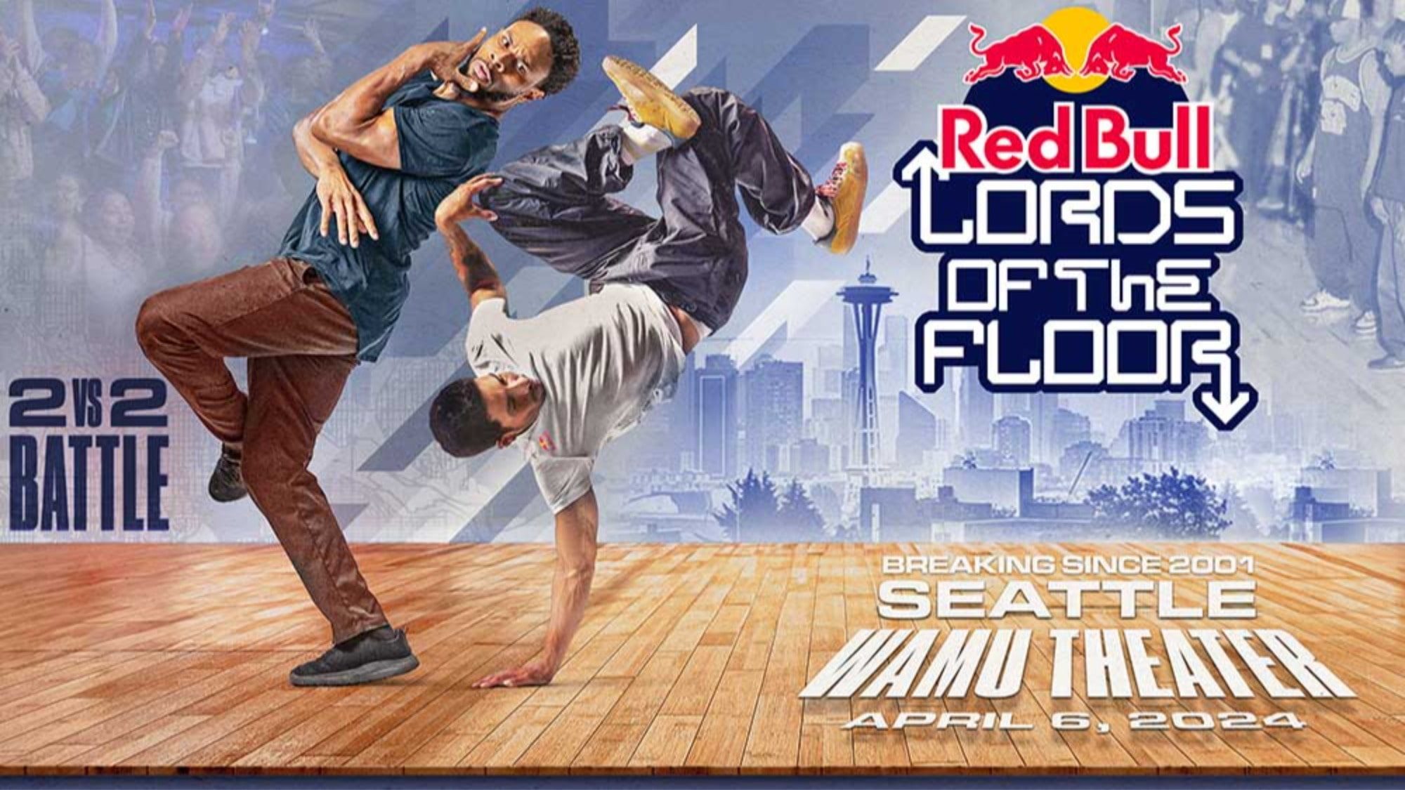 Two breakdancers in action at the Red Bull Lords of the Floor event featuring Tom Segura.