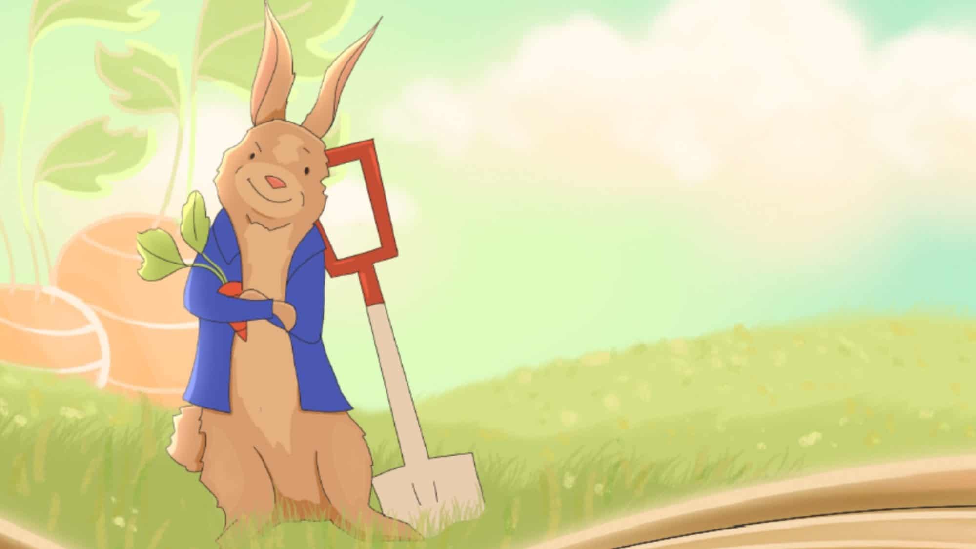 Peter Rabbit, an animated character from the beloved children's book, stands with a shovel beside a path on a sunny day, dressed in his iconic clothes.