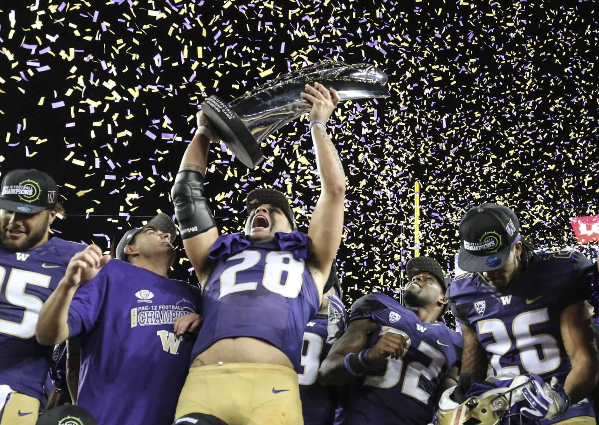 Washington Huskies celebrate following the Pac-12 Championship game against the Colorado Buffaloes in Santa Clara, Calif. on Friday, Dec. 2, 2016. Washington defeated Colorado 41-10. (Spencer Allen/IOS via AP Images)