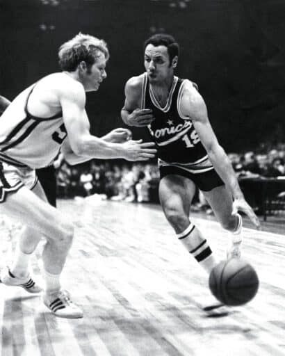 Lenny Wilkens (right)was an NBA All-Star as a player nine times and as a head coach four times.