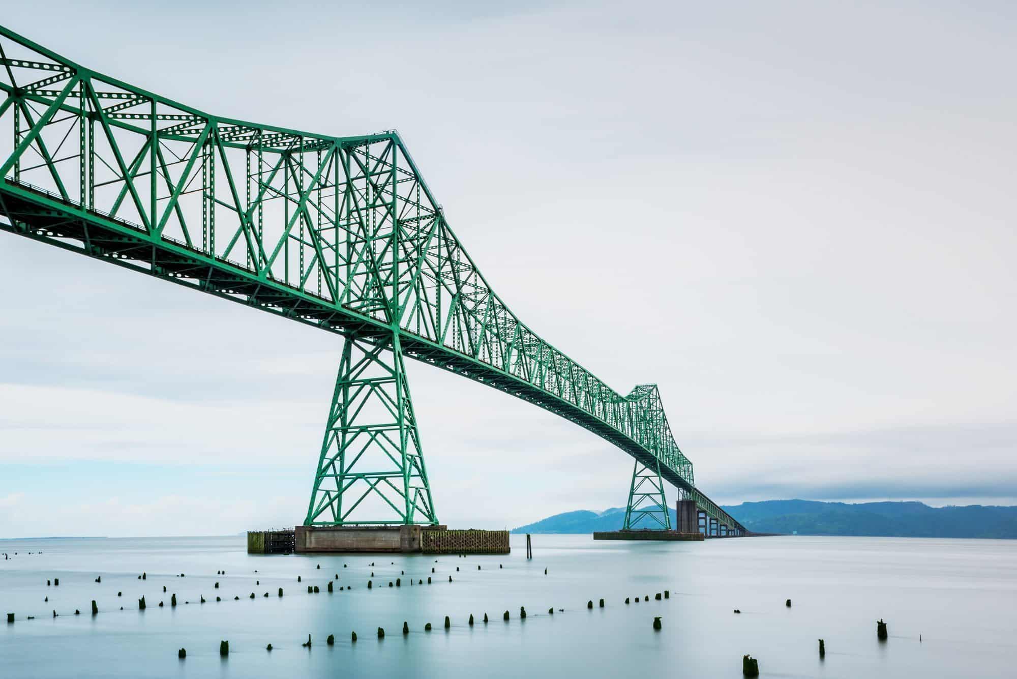 Long Exposure of the Astoria-Megler Bridge, Columbia River and Pacific Ocean in Astoria, Oregon, USA. Across the river begins the state of Washington.