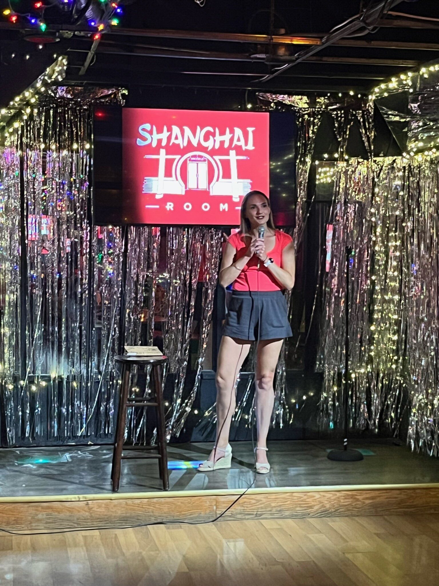 The author performing her comedy routine