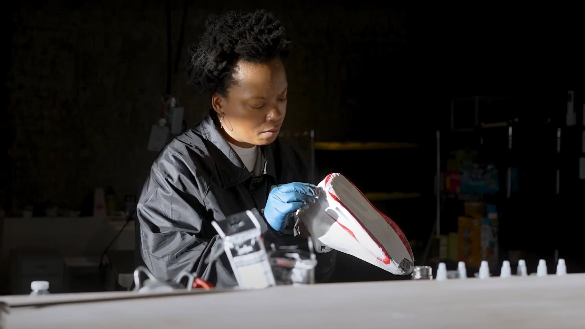 Takiyah Ward restoring sneakers, giving them new life and keeping them out of landfills.