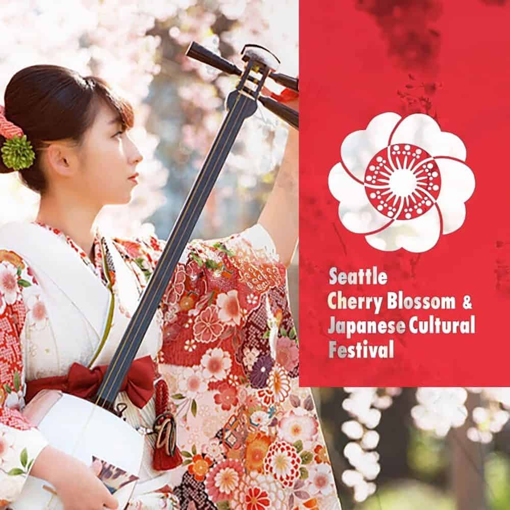 Woman in traditional Japanese attire with cherry blossoms, promoting the Seattle Cherry Blossom & Japanese Cultural Festival, scheduled for April 11-17.